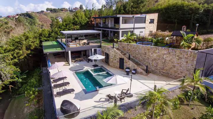 The residency house in the hills above Medellín, with its pool and terraces